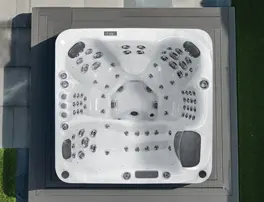 Overhead view of hot tub shell showing jet placement and seating layout for residential spas